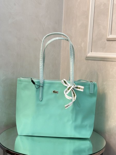 حقيبة Lacoste لون ازرق سماوي